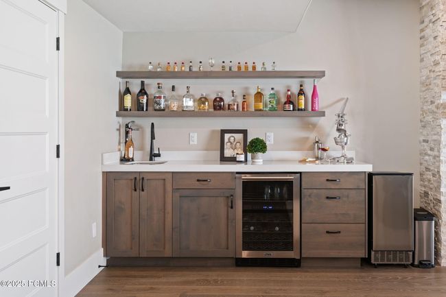 Lower level family room wet bar | Image 19