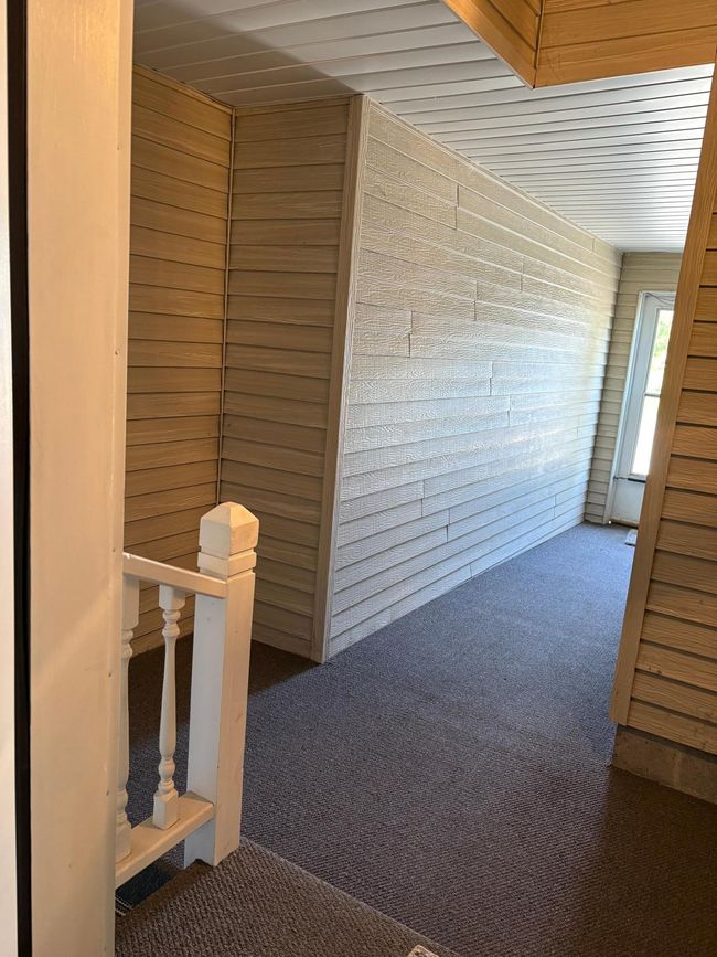 shared enclosed entrance into back of unit | Image 48