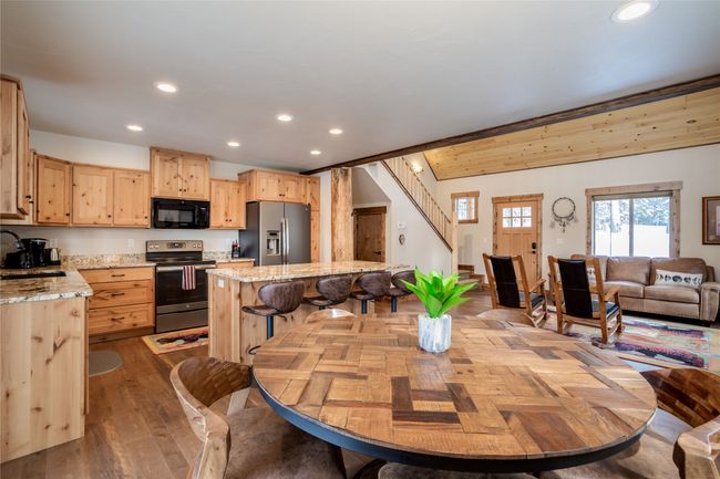 Dining area looking into Kitchen & living room | Image 9