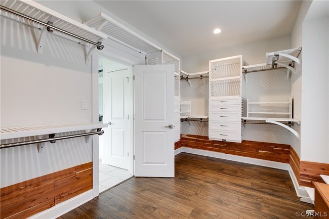 Spacious closet featuring hardwood / wood-style flooring | Image 26