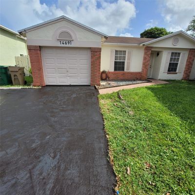 14691 N Beckley Sq, House other with 4 bedrooms, 2 bathrooms and null parking in Davie FL | Image 1