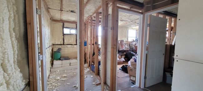 Guest apartment - Directly ahead is the bathroom, to the right is the first bedroom. | Image 18