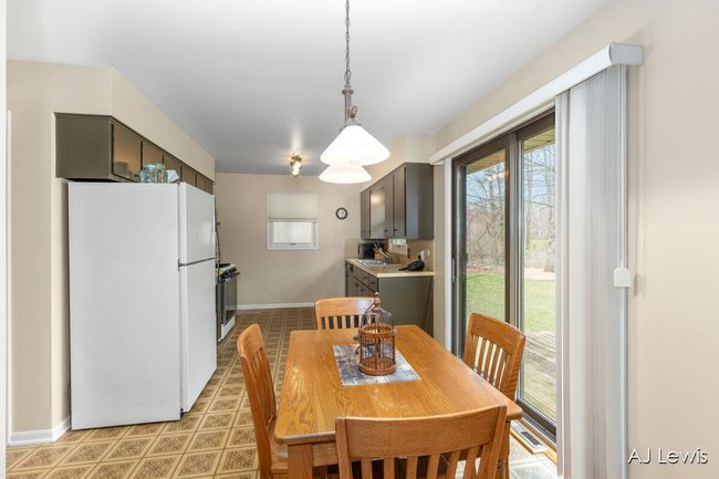 Kitchen/dining area w/slider to deck | Image 6