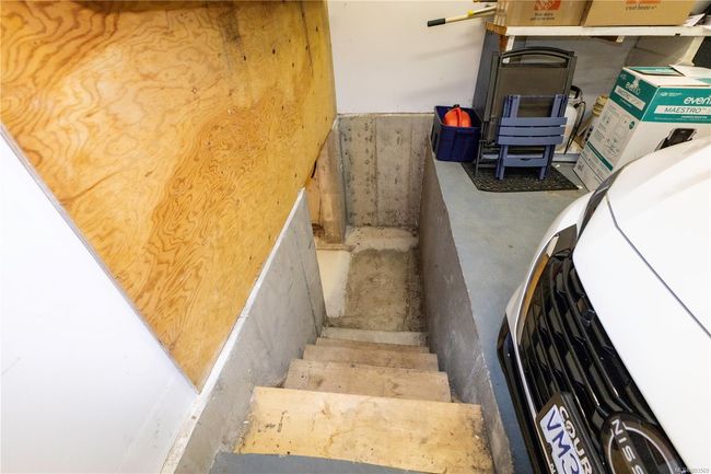 Nice sized garage with stairs to the 6ft crawl space | Image 44