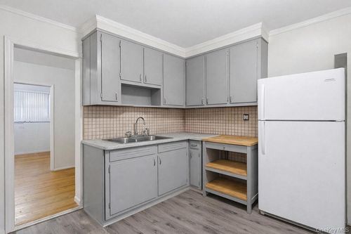 87 95th Ave, Ozone Park, NY, 11416-1316 | Card Image