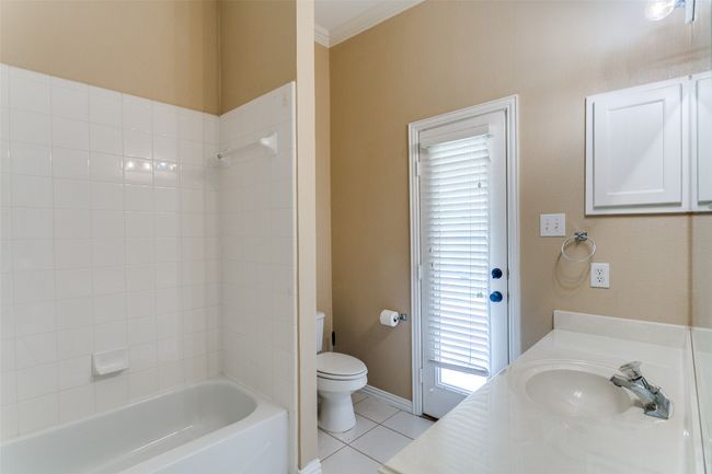 Downstairs full bath room with access to backyard | Image 12