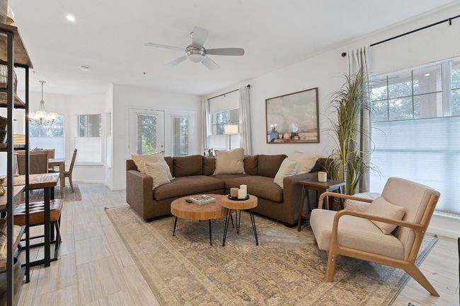 Living room with lots of natural light (windows) and beautiful floors. Looking East and Southeast. | Image 5