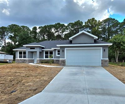 1982 Red Bud Circle Nw, House other with 4 bedrooms, 3 bathrooms and null parking in Palm Bay FL | Image 2