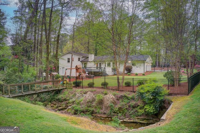 7295 Hunters Branch Dr, House other with 4 bedrooms, 3 bathrooms and null parking in Sandy Springs GA | Image 37