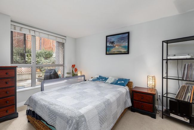 Bedroom featuring carpet | Image 19