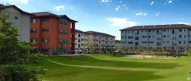 View of home's community featuring view of golf course | Image 6