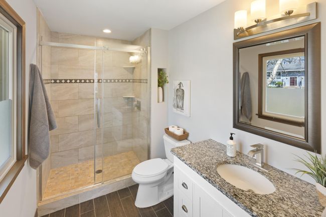 This private 3/4 bath was added in 2015 to the owner's suite. | Image 15
