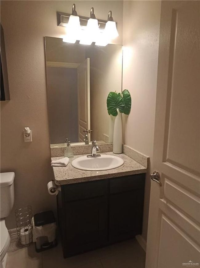 Bathroom with vanity and tile patterned floors | Image 8