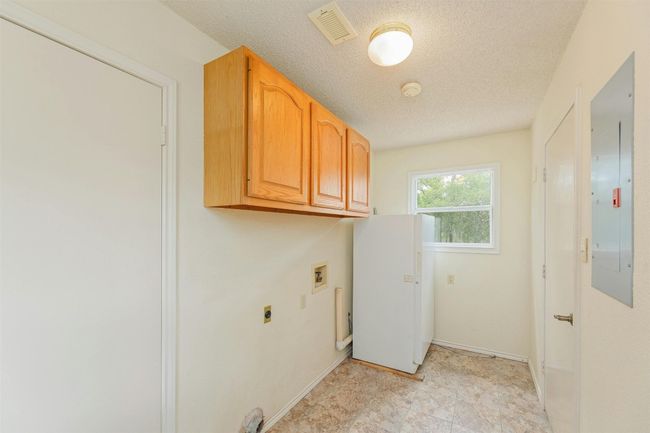 Utility with space for an additional fridge or freezer. | Image 21