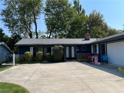 Ranch-style home with a garage | Image 2