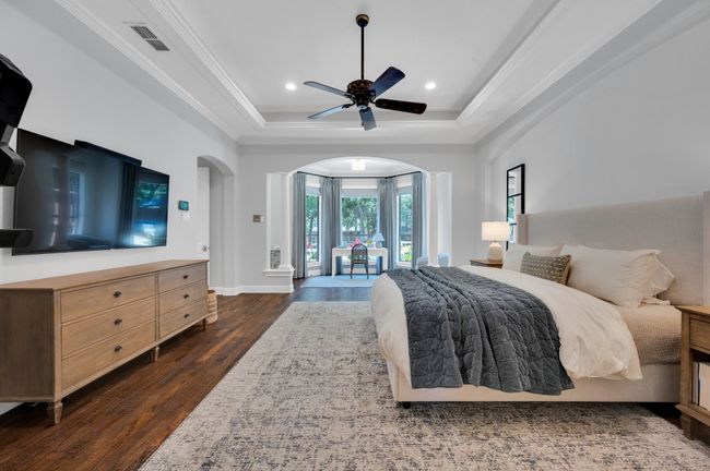 Oversized primary bedroom with extra sitting space for an office or reading nook | Image 5