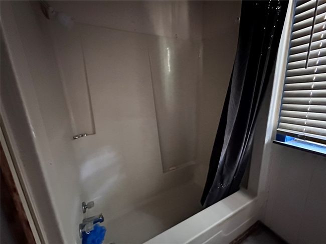 Full bath featuring shower / bathtub combination with curtain | Image 19
