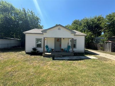 Rear view of house featuring a yard | Image 1