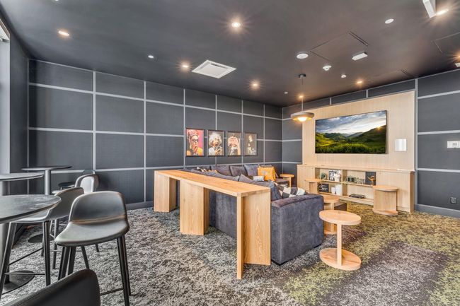 Carpeted cinema room with recessed lighting | Image 30