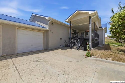 a-1401 Thaxton Ct, Laramie, WY, 82072-1972 | Card Image