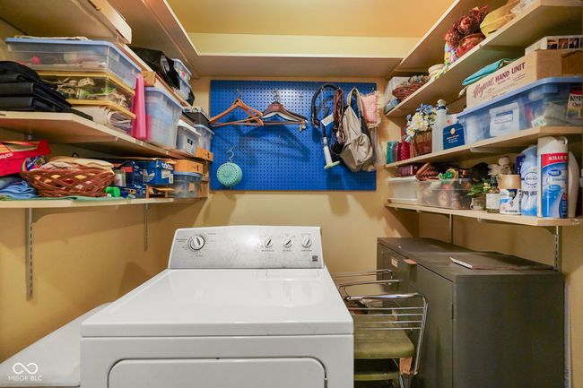 laundry area with independent washer and dryer | Image 30