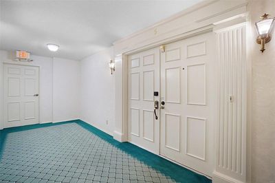 Secure living with hall entry to the condo. | Image 3