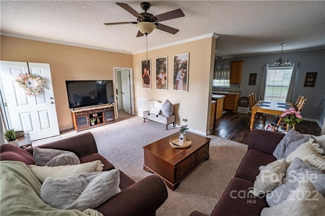 One of the living room areas by front door. | Image 15