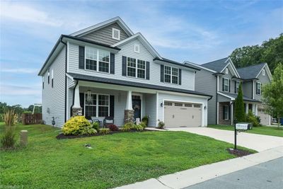 Nicely landscaped w/fenced backyard | Image 2