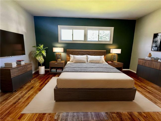 Virtually staged Bedroom with hardwood / wood-style floors | Image 16