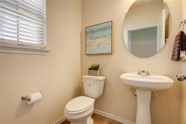 Half bath featuring toilet and baseboards | Image 32