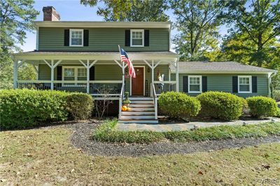 View of front of property featuring covered porch | Image 1