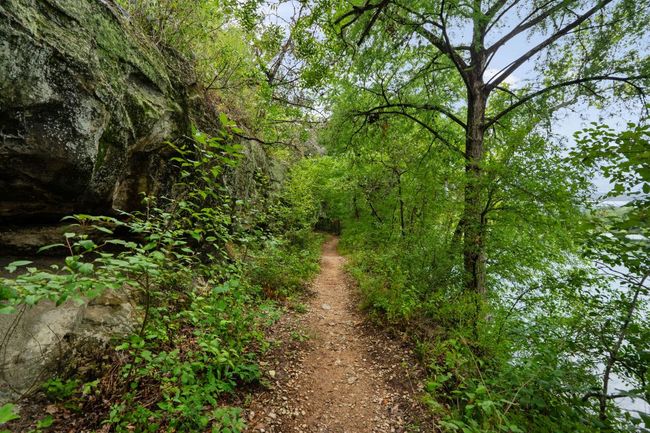 A scenic three-mile hike and bike trail winds through the neighborhood’s greenbelts and connects to Lake Austin, perfect for running, biking, or leisurely walks. | Image 39