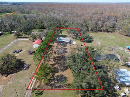 12001 Dozer Ln, THONOTOSASSA, FL, 33592-2563 | Card Image