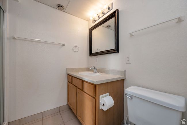 Bathroom featuring vanity and tile patterned flooring | Image 14