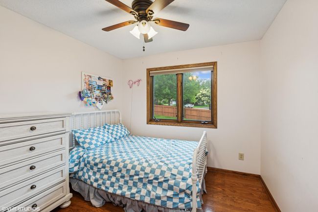 Upper-level bedroom #3—offers versatile space for guests, office, or hobbies | Image 27