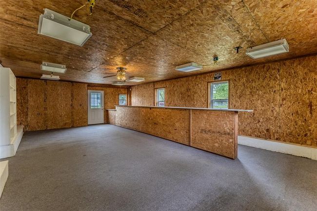 Carpeted empty room with a ceiling fan | Image 46
