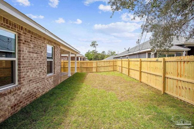 8512 Esplanade St, House other with 4 bedrooms, 2 bathrooms and 2 parking in Navarre FL | Image 11
