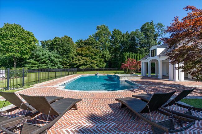 View of pool featuring a patio area | Image 38
