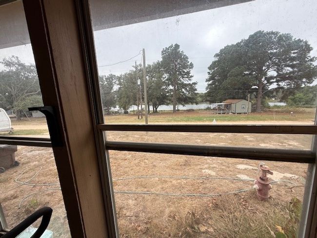 View of lake from living room | Image 48