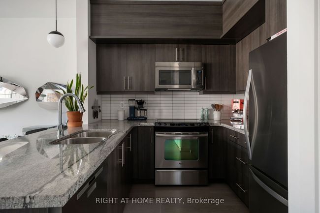 118 - 2320 Gerrard St E, Condo with 3 bedrooms, 2 bathrooms and 26 parking in Toronto ON | Image 9