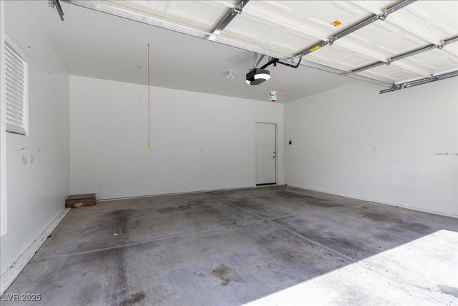 Garage with a garage door opener | Image 39