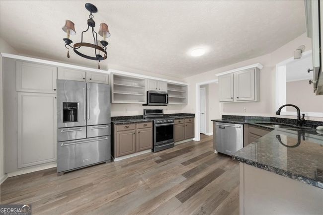 6715 N Glen Dr, House other with 4 bedrooms, 3 bathrooms and null parking in Cumming GA | Image 12