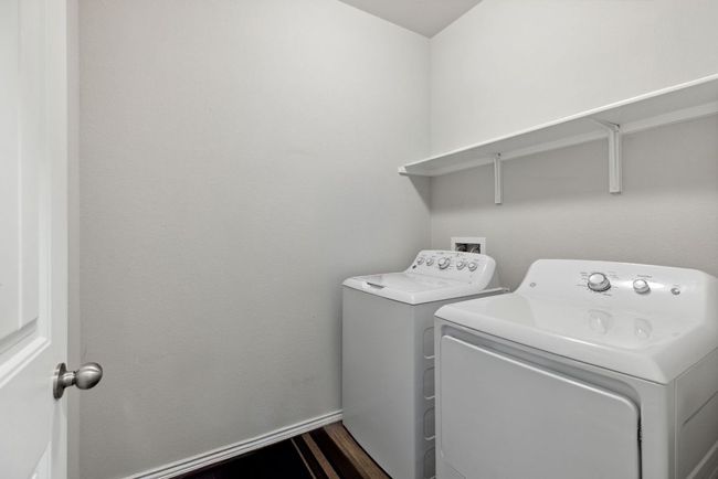 Washroom with separate washer and dryer | Image 17