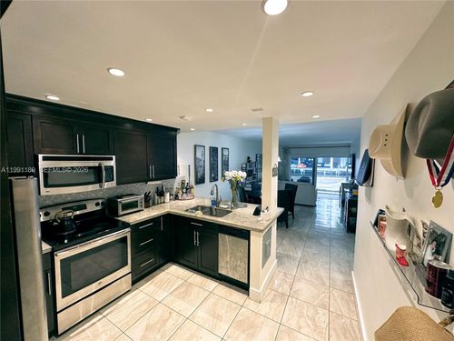 102-450 Paradise Isle Blvd, Hallandale Beach, FL, 33009-5840 | Card Image
