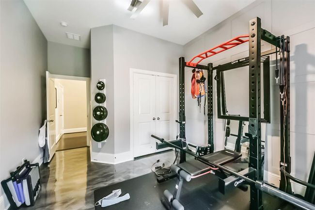 4th room/flex space has ample natural light, and a ceiling fan, perfect for fitness enthusiasts. | Image 28