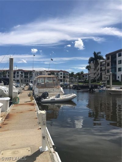 Dock area featuring a water view | Image 3