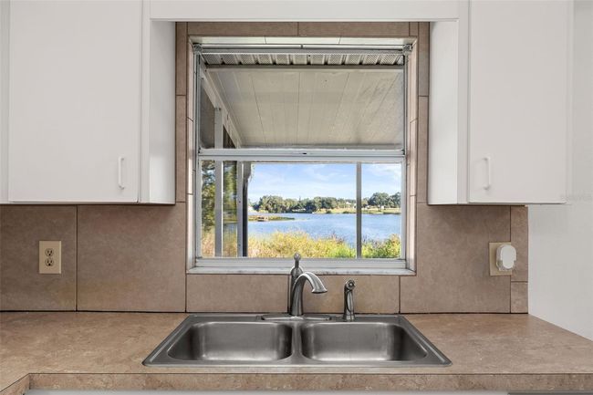Great view of lake from kitchen window. | Image 6