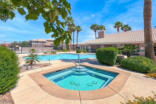 Community pool with a community hot tub | Image 36