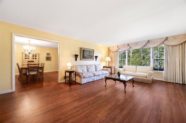 Living Room featuring hardwood floors and views to backyard | Image 8