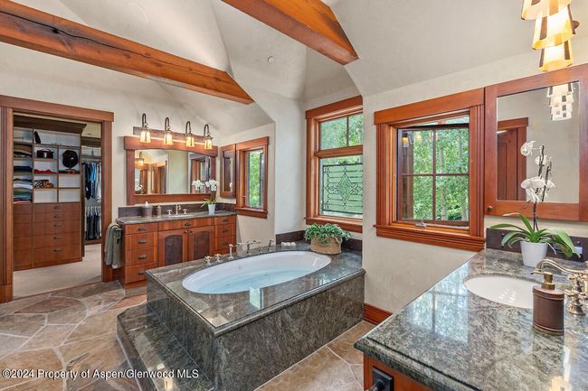 Sounds of the river will greet you in the morning. Bath opens into generous closet. | Image 31